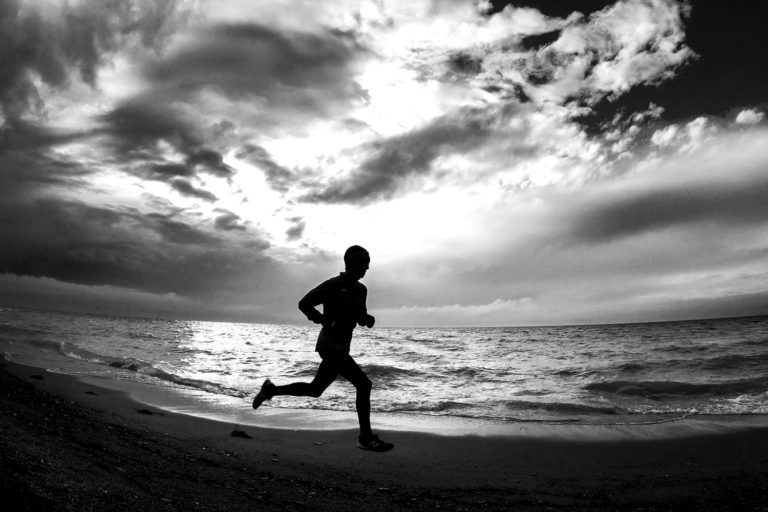 Running beach black and white