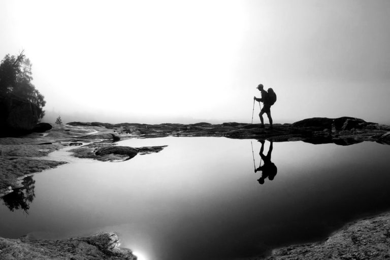 Hiking black and white reflection