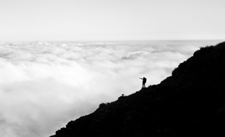 Hiking black and white silhouette clouds