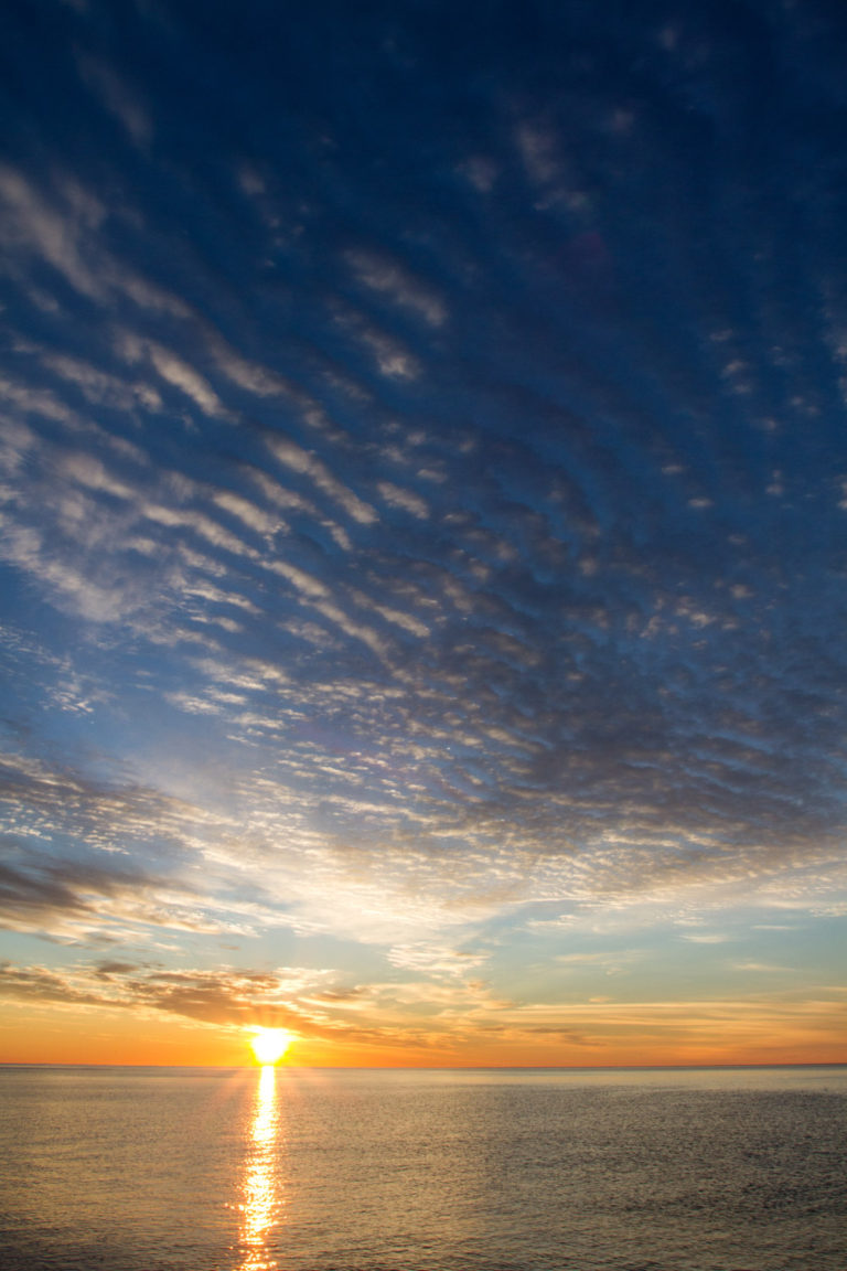 sunrise clouds ocean