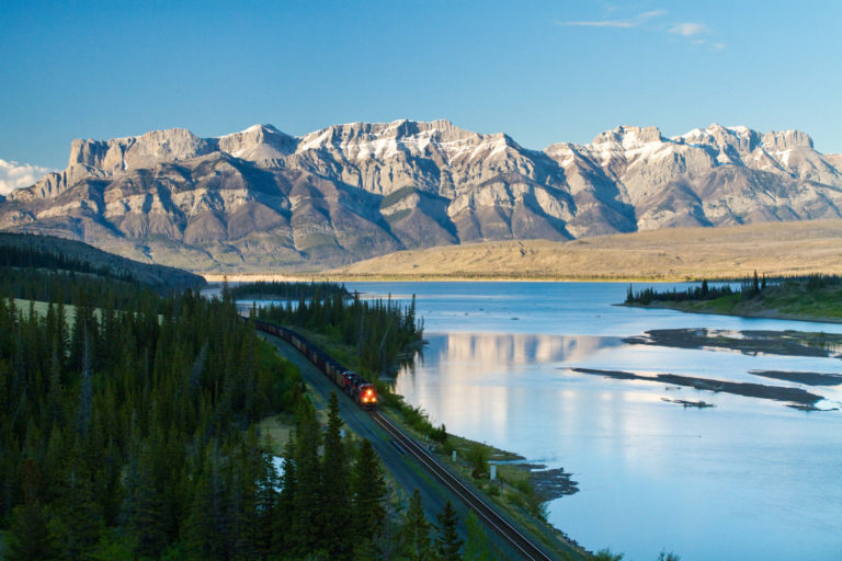 mountains train lake