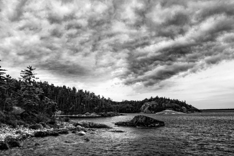 Black and white coast lake clouds