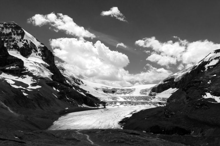 glacier black and white mountains