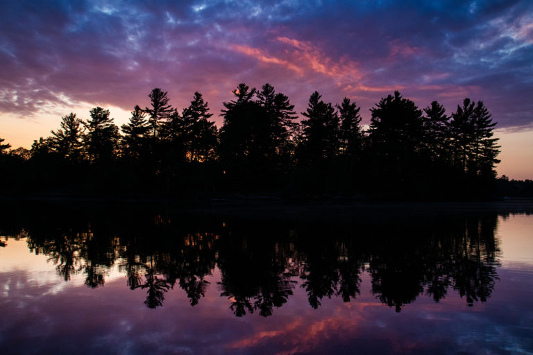 sunset lake trees reflection