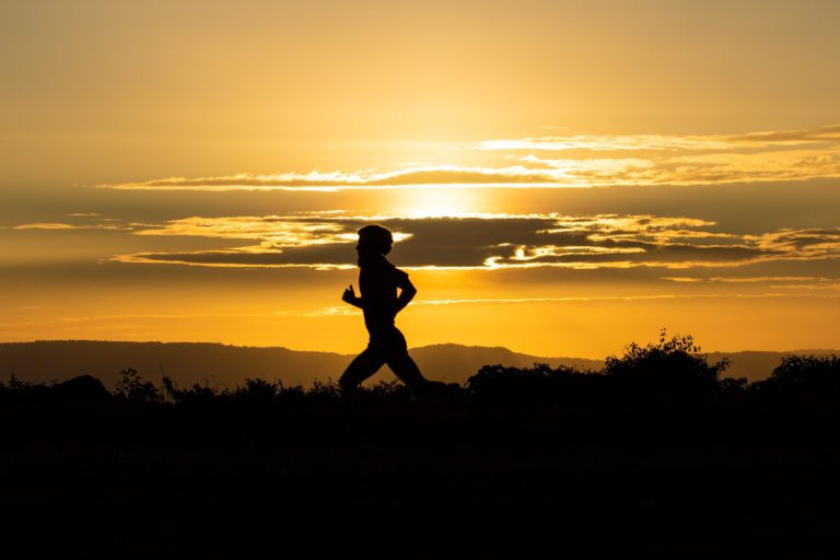 Running sunrise silhouette