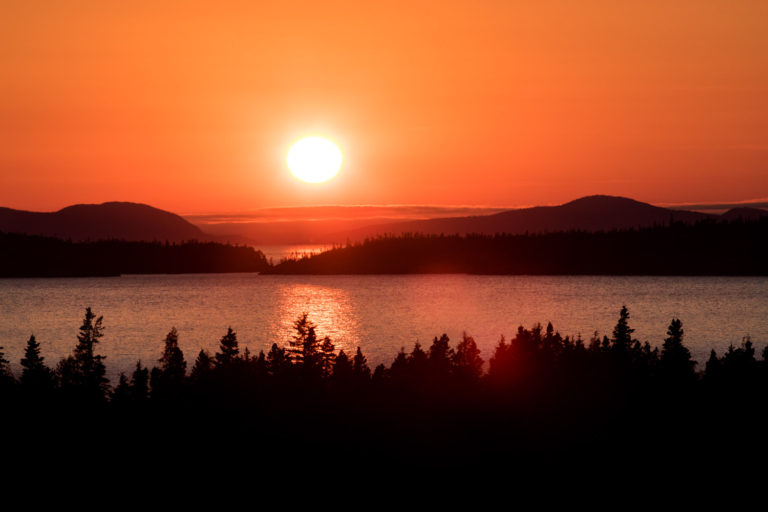 sunset lake trees orange