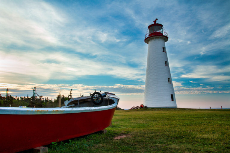 lighthouse boat sky