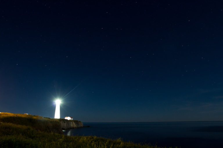 lighthouse night stars