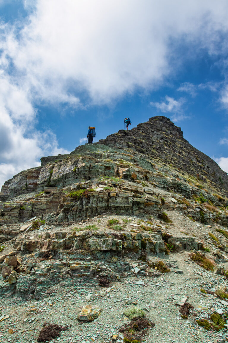 mountain hiker sky