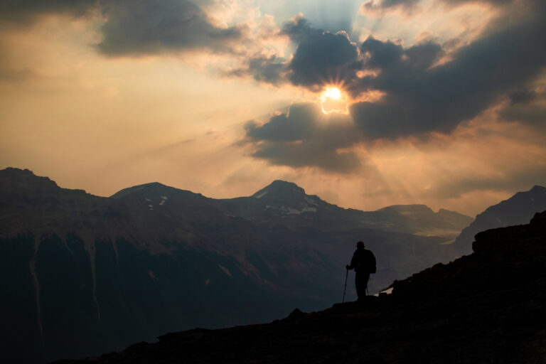 mountains hiker sunrise